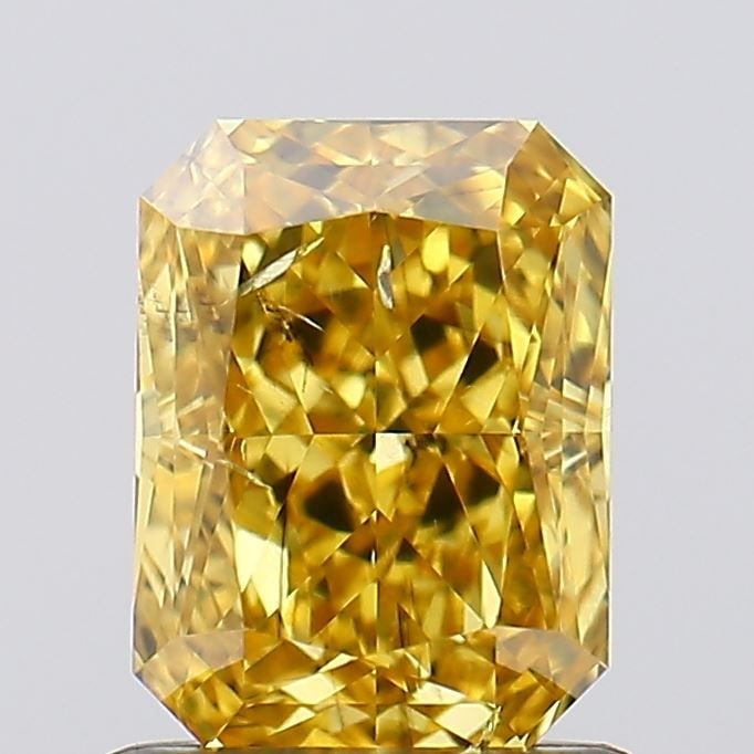 Loose Diamond - RADIANT 1.02ct Fancy Vivid Yellow SI2: Loose Diamond - RADIANT 1.02ct Fancy Vivid Yellow SI2 Source: This is a real non-mined Diamond that has been grown in a lab Shape: RADIANT Carats: 1.02 Color: Fancy Vivid Yellow Certification: IGI Vid