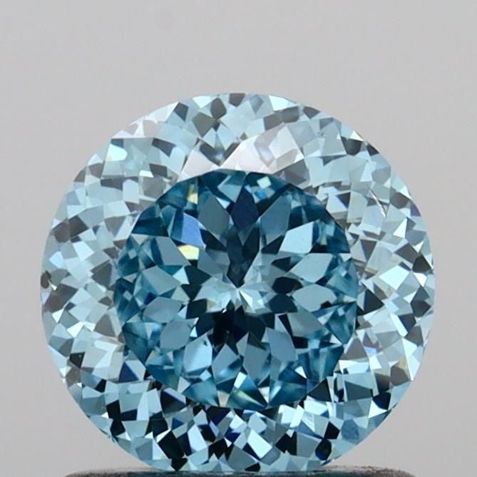 Loose Diamond - ROUND 1.01ct Fancy Vivid Blue VS2: Loose Diamond - ROUND 1.01ct Fancy Vivid Blue VS2 Source: This is a real non-mined Diamond that has been grown in a lab Shape: ROUND Carats: 1.01 Color: Fancy Vivid Blue Certification: IGI Video: