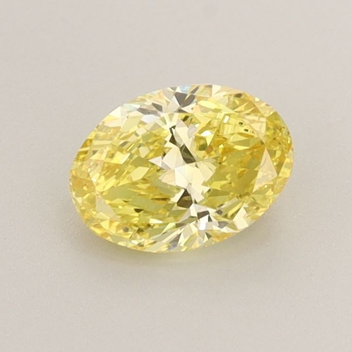 Loose Diamond - OVAL 0.76ct Fancy Vivid Yellow VS1: Loose Diamond - OVAL 0.76ct Fancy Vivid Yellow VS1 Source: This is a real non-mined Diamond that has been grown in a lab Shape: OVAL Carats: 0.76 Color: Fancy Vivid Yellow Certification: IGI Video:
