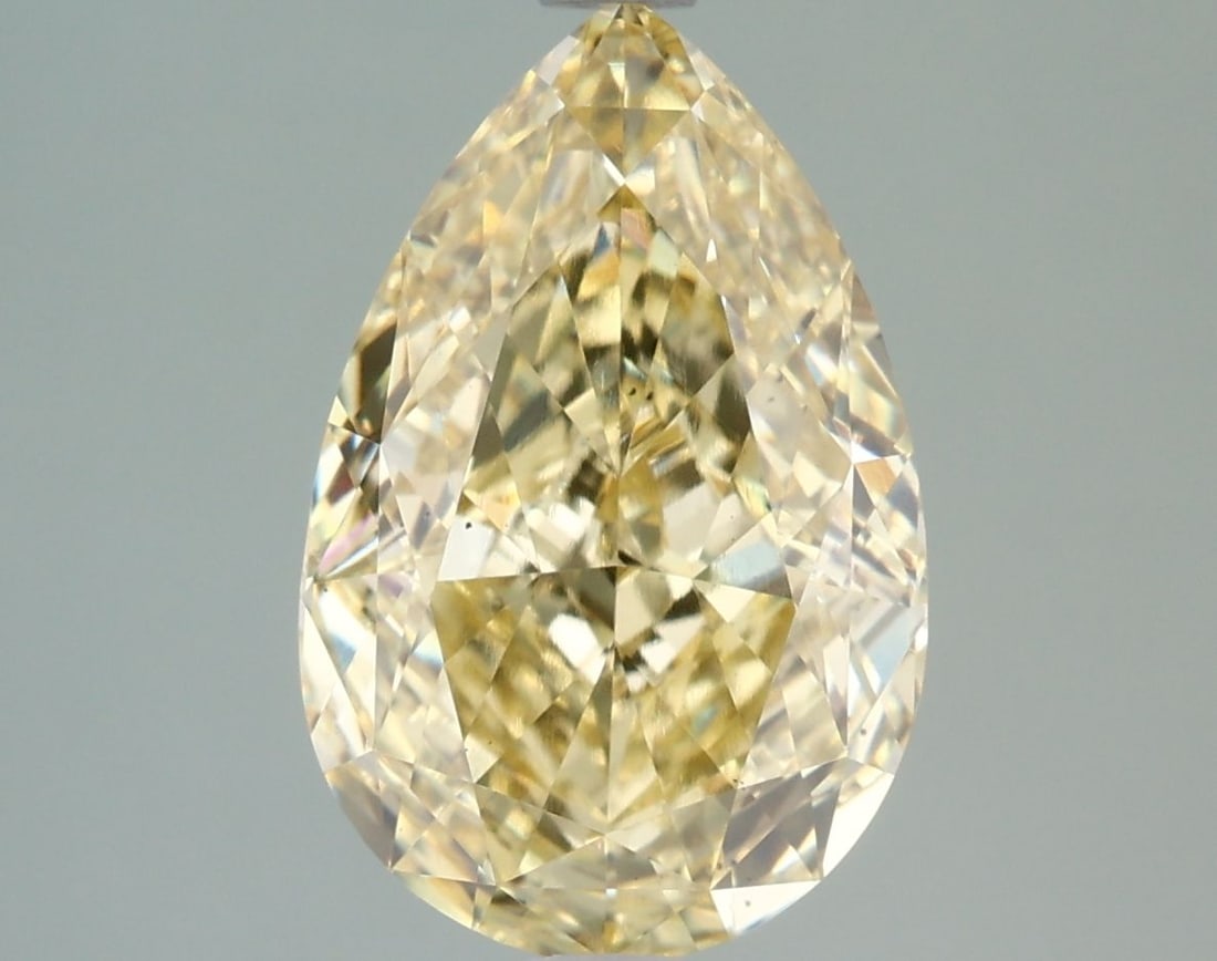 Loose Diamond - PEAR 3.11ct Fancy Intense Yellow VS2: Loose Diamond - PEAR 3.11ct Fancy Intense Yellow VS2 Source: This is a real non-mined Diamond that has been grown in a lab Shape: PEAR Carats: 3.11 Color: Fancy Intense Yellow Certification: IGI Video
