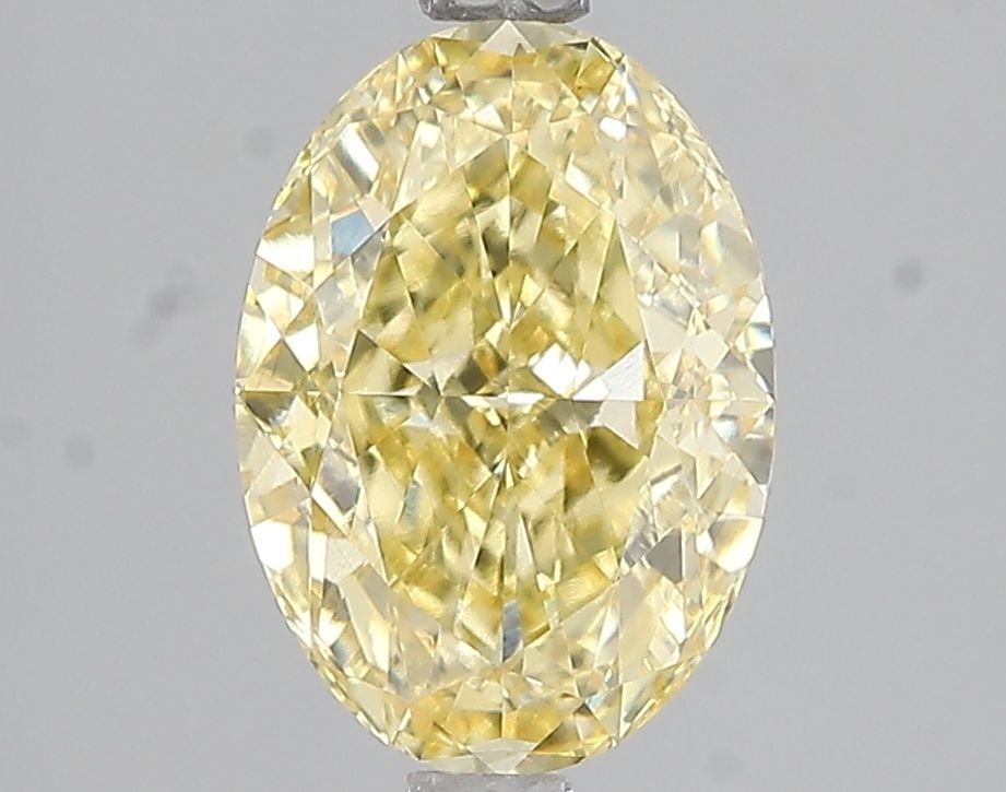 Loose Diamond - OVAL 2.58ct Fancy Intense Yellow VS1: Loose Diamond - OVAL 2.58ct Fancy Intense Yellow VS1 Source: This is a real non-mined Diamond that has been grown in a lab Shape: OVAL Carats: 2.58 Color: Fancy Intense Yellow Certification: IGI Video