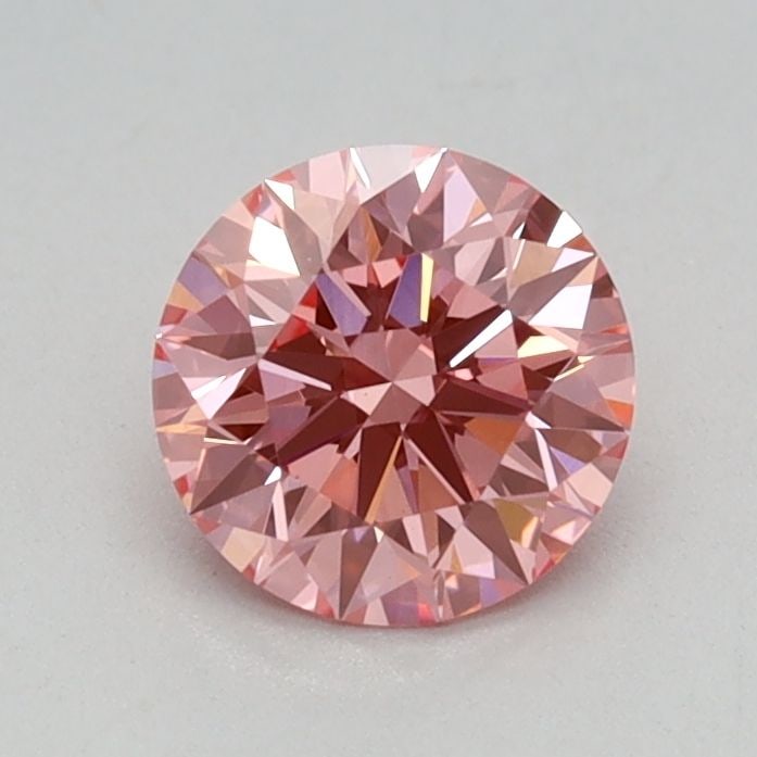 Ideal Loose Diamond - ROUND 0.55ct Fancy Vivid Pink VVS2: Ideal Loose Diamond - ROUND 0.55ct Fancy Vivid Pink VVS2 Source: This is a real non-mined Diamond that has been grown in a lab Shape: ROUND Carats: 0.55 Color: Fancy Vivid Pink Certification: IGI