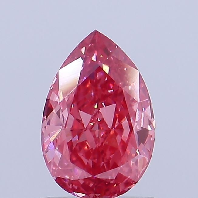 Loose Diamond - PEAR 0.78ct Fancy Vivid Pink VVS2: Loose Diamond - PEAR 0.78ct Fancy Vivid Pink VVS2 Source: This is a real non-mined Diamond that has been grown in a lab Shape: PEAR Carats: 0.78 Color: Fancy Vivid Pink Certification: IGI Video: