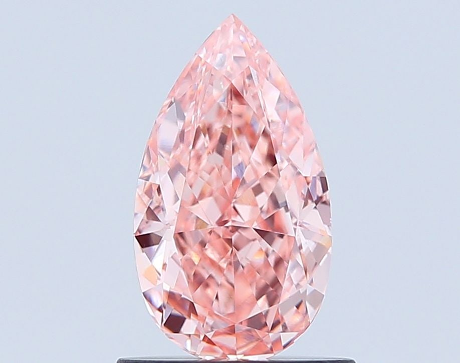 Loose Diamond - PEAR 1.01ct Fancy Vivid Pink VS1: Loose Diamond - PEAR 1.01ct Fancy Vivid Pink VS1 Source: This is a real non-mined Diamond that has been grown in a lab Shape: PEAR Carats: 1.01 Color: Fancy Vivid Pink Certification: IGI Video: Video