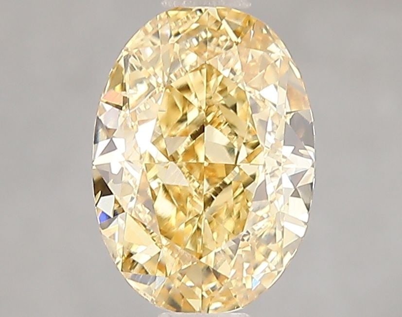Loose Diamond - OVAL 2.01ct Fancy Vivid Yellow VS2: Loose Diamond - OVAL 2.01ct Fancy Vivid Yellow VS2 Source: This is a real non-mined Diamond that has been grown in a lab Shape: OVAL Carats: 2.01 Color: Fancy Vivid Yellow Certification: IGI Video: