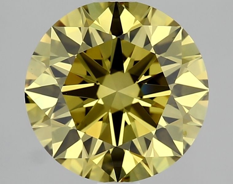 Ideal Loose Diamond - ROUND 2.06ct Fancy Vivid Yellow IF: Ideal Loose Diamond - ROUND 2.06ct Fancy Vivid Yellow IF Source: This is a real non-mined Diamond that has been grown in a lab Shape: ROUND Carats: 2.06 Color: Fancy Vivid Yellow Certification: IGI Vi