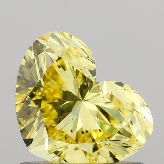 Loose Diamond - HEART 0.82ct Fancy Intense Yellow SI1: Loose Diamond - HEART 0.82ct Fancy Intense Yellow SI1 Source: This is a real non-mined Diamond that has been grown in a lab Shape: HEART Carats: 0.82 Color: Fancy Intense Yellow Certification: IGI Vid