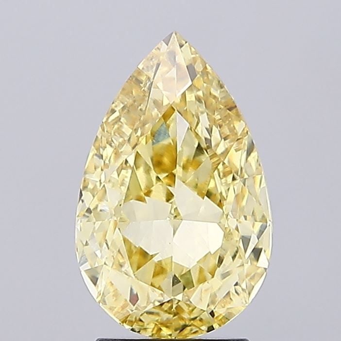 Loose Diamond - PEAR 3.14ct Fancy Vivid Yellow VS1: Loose Diamond - PEAR 3.14ct Fancy Vivid Yellow VS1 Source: This is a real non-mined Diamond that has been grown in a lab Shape: PEAR Carats: 3.14 Color: Fancy Vivid Yellow Certification: IGI Video: