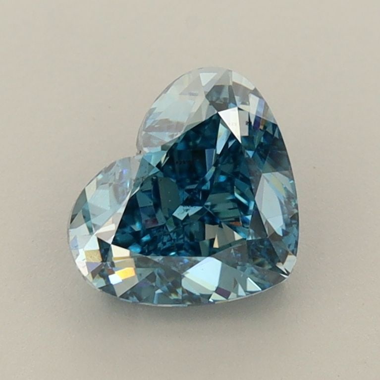 Loose Diamond - HEART 1.5ct Fancy Vivid Blue VS1: Loose Diamond - HEART 1.5ct Fancy Vivid Blue VS1 Source: This is a real non-mined Diamond that has been grown in a lab Shape: HEART Carats: 1.5 Color: Fancy Vivid Blue Certification: IGI Video: