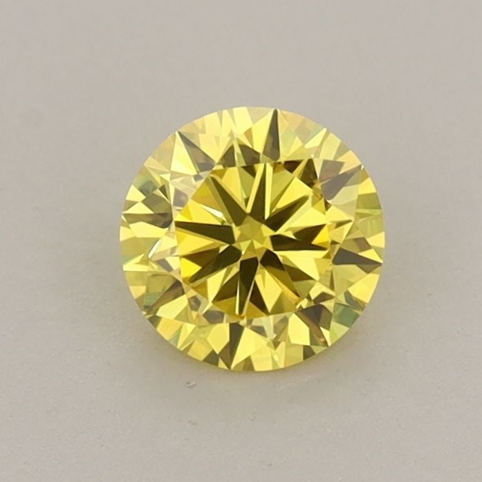 Loose Diamond - ROUND 0.56ct Fancy Intense Yellow VS1: Loose Diamond - ROUND 0.56ct Fancy Intense Yellow VS1 Source: This is a real non-mined Diamond that has been grown in a lab Shape: ROUND Carats: 0.56 Color: Fancy Intense Yellow Certification: IGI Vid