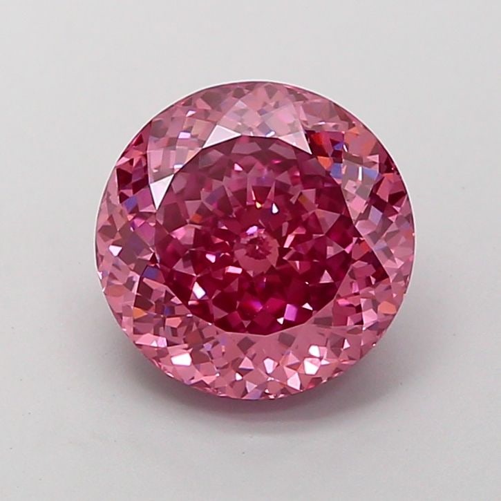 Loose Diamond - ROUND 3.06ct Fancy Vivid Pink VS1: Loose Diamond - ROUND 3.06ct Fancy Vivid Pink VS1 Source: This is a real non-mined Diamond that has been grown in a lab Shape: ROUND Carats: 3.06 Color: Fancy Vivid Pink Certification: IGI Video: