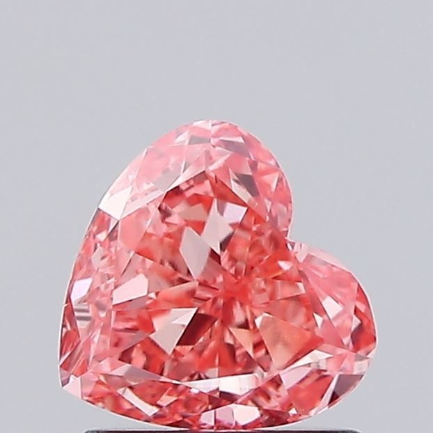 Loose Diamond - HEART 0.91ct Fancy Vivid Pink VS1: Loose Diamond - HEART 0.91ct Fancy Vivid Pink VS1 Source: This is a real non-mined Diamond that has been grown in a lab Shape: HEART Carats: 0.91 Color: Fancy Vivid Pink Certification: IGI Video: