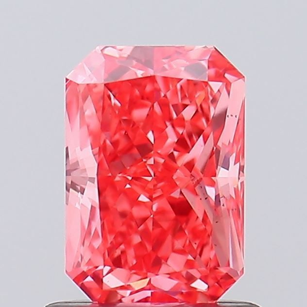 Loose Diamond - RADIANT 1.0ct Fancy Vivid Pink VS2: Loose Diamond - RADIANT 1.0ct Fancy Vivid Pink VS2 Source: This is a real non-mined Diamond that has been grown in a lab Shape: RADIANT Carats: 1.0 Color: Fancy Vivid Pink Certification: IGI Video: