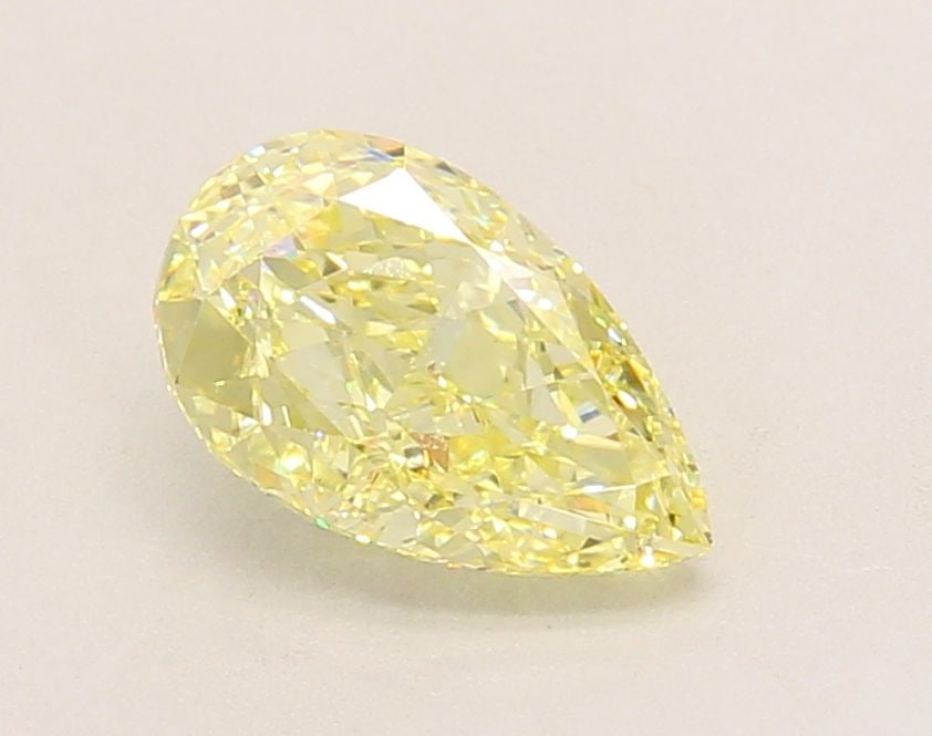 Loose Diamond - PEAR 1.4ct Fancy Yellow VVS2: Loose Diamond - PEAR 1.4ct Fancy Yellow VVS2 Source: This is a real non-mined Diamond that has been grown in a lab Shape: PEAR Carats: 1.4 Color: Fancy Yellow Certification: IGI Video: