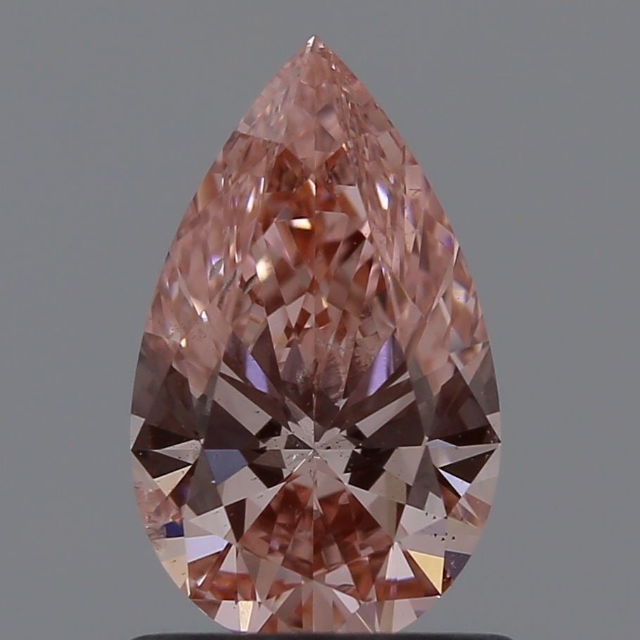 Loose Diamond - PEAR 0.91ct Fancy Vivid Pink SI1: Loose Diamond - PEAR 0.91ct Fancy Vivid Pink SI1 Source: This is a real non-mined Diamond that has been grown in a lab Shape: PEAR Carats: 0.91 Color: Fancy Vivid Pink Certification: IGI Video: