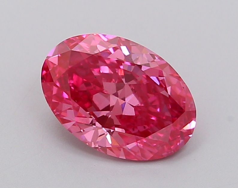 Loose Diamond - OVAL 1.39ct Fancy Vivid Pink VS2: Loose Diamond - OVAL 1.39ct Fancy Vivid Pink VS2 Source: This is a real non-mined Diamond that has been grown in a lab Shape: OVAL Carats: 1.39 Color: Fancy Vivid Pink Certification: IGI Video: