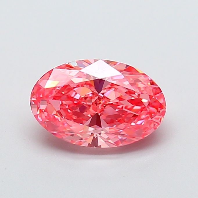 Loose Diamond - OVAL 2.1ct Fancy Vivid Pink VS1: Loose Diamond - OVAL 2.1ct Fancy Vivid Pink VS1 Source: This is a real non-mined Diamond that has been grown in a lab Shape: OVAL Carats: 2.1 Color: Fancy Vivid Pink Certification: IGI Video: