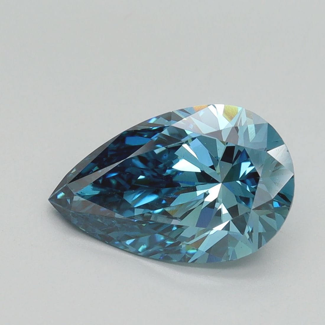 Loose Diamond - PEAR 2.12ct Fancy Vivid Blue VS1: Loose Diamond - PEAR 2.12ct Fancy Vivid Blue VS1 Source: This is a real non-mined Diamond that has been grown in a lab Shape: PEAR Carats: 2.12 Color: Fancy Vivid Blue Certification: IGI Video: