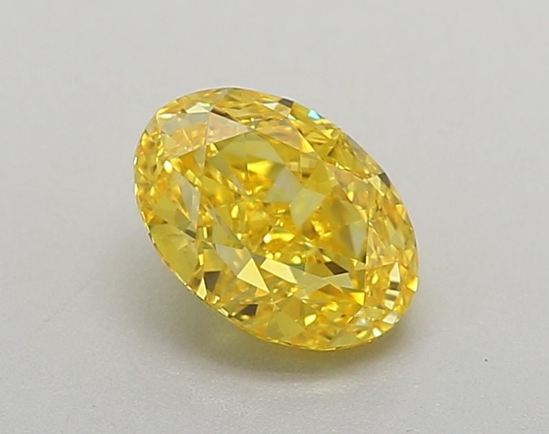 Loose Diamond - OVAL 1.03ct Fancy Vivid Yellow VVS2: Loose Diamond - OVAL 1.03ct Fancy Vivid Yellow VVS2 Source: This is a real non-mined Diamond that has been grown in a lab Shape: OVAL Carats: 1.03 Color: Fancy Vivid Yellow Certification: IGI Video: