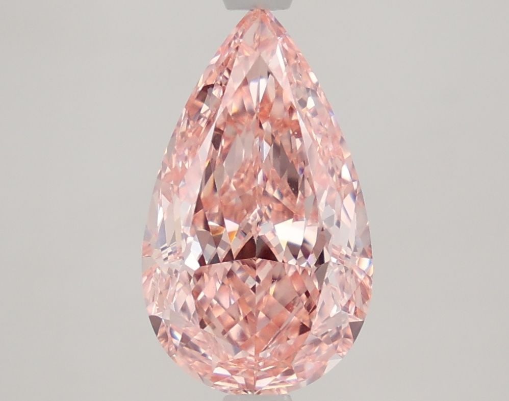 Loose Diamond - PEAR 2.4ct Fancy Vivid Pink VVS2: Loose Diamond - PEAR 2.4ct Fancy Vivid Pink VVS2 Source: This is a real non-mined Diamond that has been grown in a lab Shape: PEAR Carats: 2.4 Color: Fancy Vivid Pink Certification: IGI Video:
