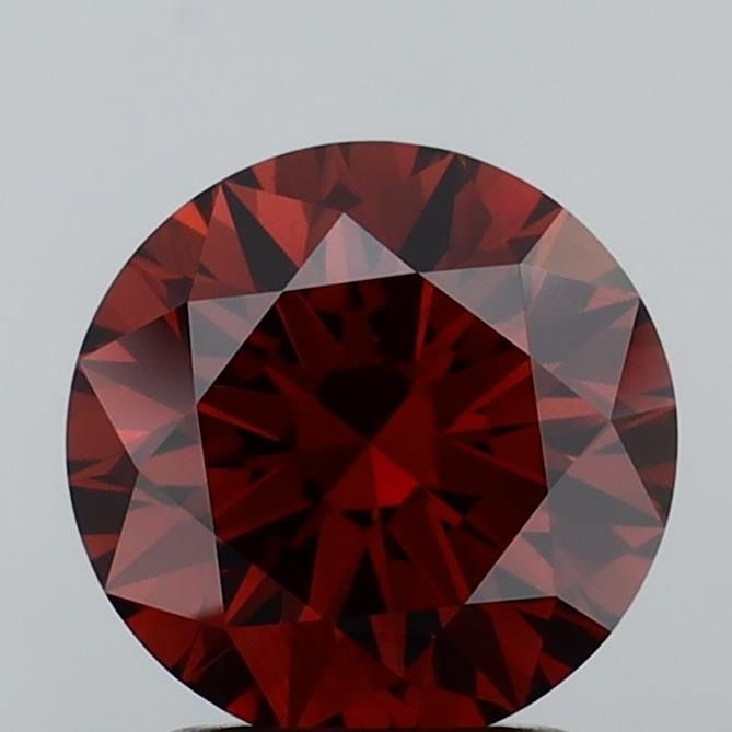 Ideal Loose Diamond - ROUND 2.03ct Fancy Orangey Brown VS1: Ideal Loose Diamond - ROUND 2.03ct Fancy Orangey Brown VS1 Source: This is a real non-mined Diamond that has been grown in a lab Shape: ROUND Carats: 2.03 Color: Fancy Orangey Brown Certification: IGI