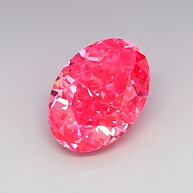 Loose Diamond - OVAL 1.01ct Fancy Vivid Pink VS2: Loose Diamond - OVAL 1.01ct Fancy Vivid Pink VS2 Source: This is a real non-mined Diamond that has been grown in a lab Shape: OVAL Carats: 1.01 Color: Fancy Vivid Pink Certification: IGI Video:
