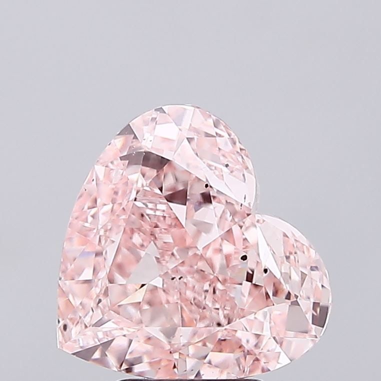 Loose Diamond - HEART 5.12ct Fancy Intense Pink SI1: Loose Diamond - HEART 5.12ct Fancy Intense Pink SI1 Source: This is a real non-mined Diamond that has been grown in a lab Shape: HEART Carats: 5.12 Color: Fancy Intense Pink Certification: IGI Video: