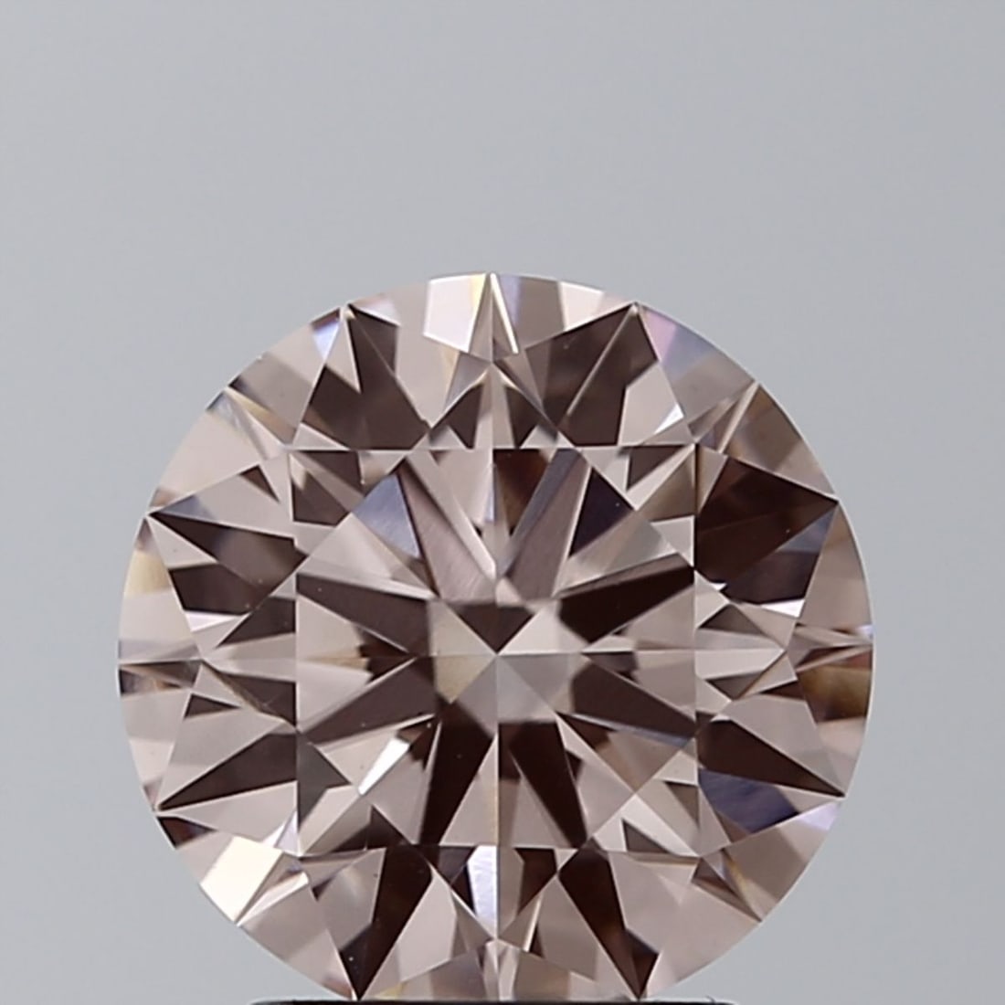 Ideal Loose Diamond - ROUND 2.1ct Fancy Pink VS1: Ideal Loose Diamond - ROUND 2.1ct Fancy Pink VS1 Source: This is a real non-mined Diamond that has been grown in a lab Shape: ROUND Carats: 2.1 Color: Fancy Pink Certification: IGI Video:
