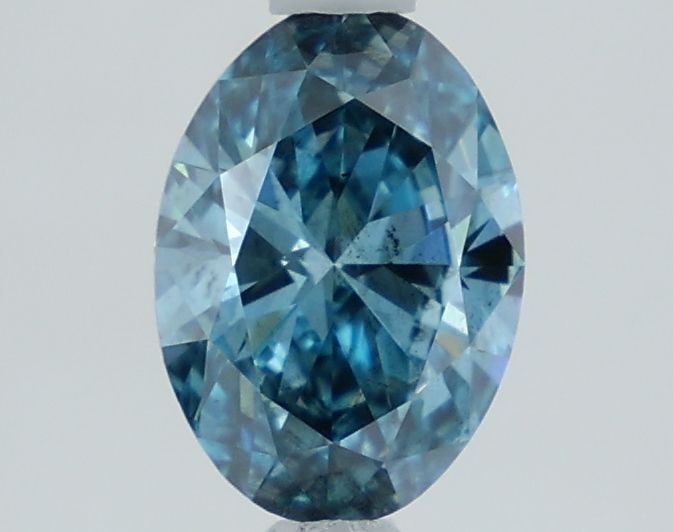 Loose Diamond - OVAL 1.06ct Fancy Vivid Blue SI1: Loose Diamond - OVAL 1.06ct Fancy Vivid Blue SI1 Source: This is a real non-mined Diamond that has been grown in a lab Shape: OVAL Carats: 1.06 Color: Fancy Vivid Blue Certification: IGI Video: