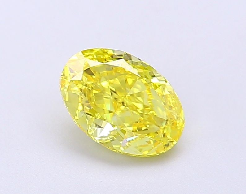 Loose Diamond - OVAL 1.01ct Fancy Vivid Yellow VS1: Loose Diamond - OVAL 1.01ct Fancy Vivid Yellow VS1 Source: This is a real non-mined Diamond that has been grown in a lab Shape: OVAL Carats: 1.01 Color: Fancy Vivid Yellow Certification: IGI Video: