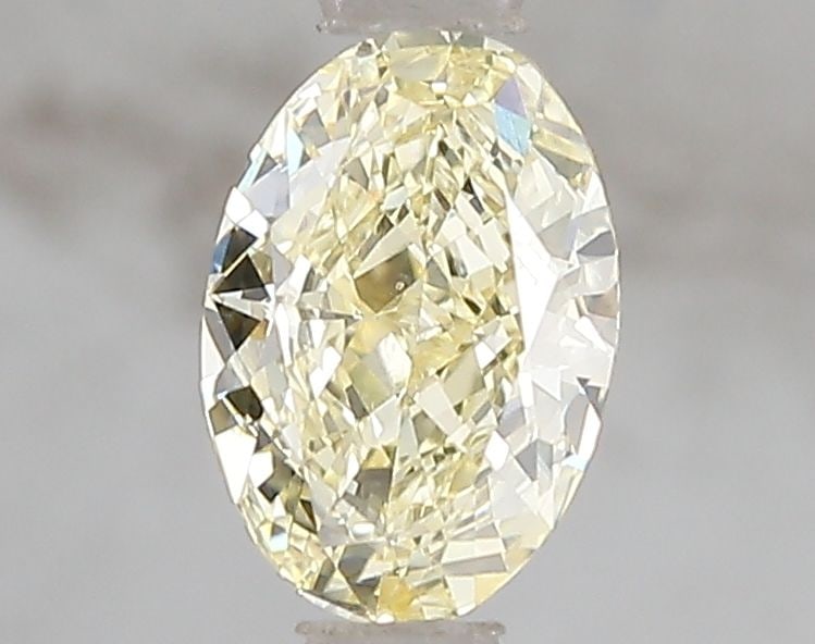 Loose Diamond - OVAL 1.03ct Fancy Intense Yellow VS1: Loose Diamond - OVAL 1.03ct Fancy Intense Yellow VS1 Source: This is a real non-mined Diamond that has been grown in a lab Shape: OVAL Carats: 1.03 Color: Fancy Intense Yellow Certification: IGI Video