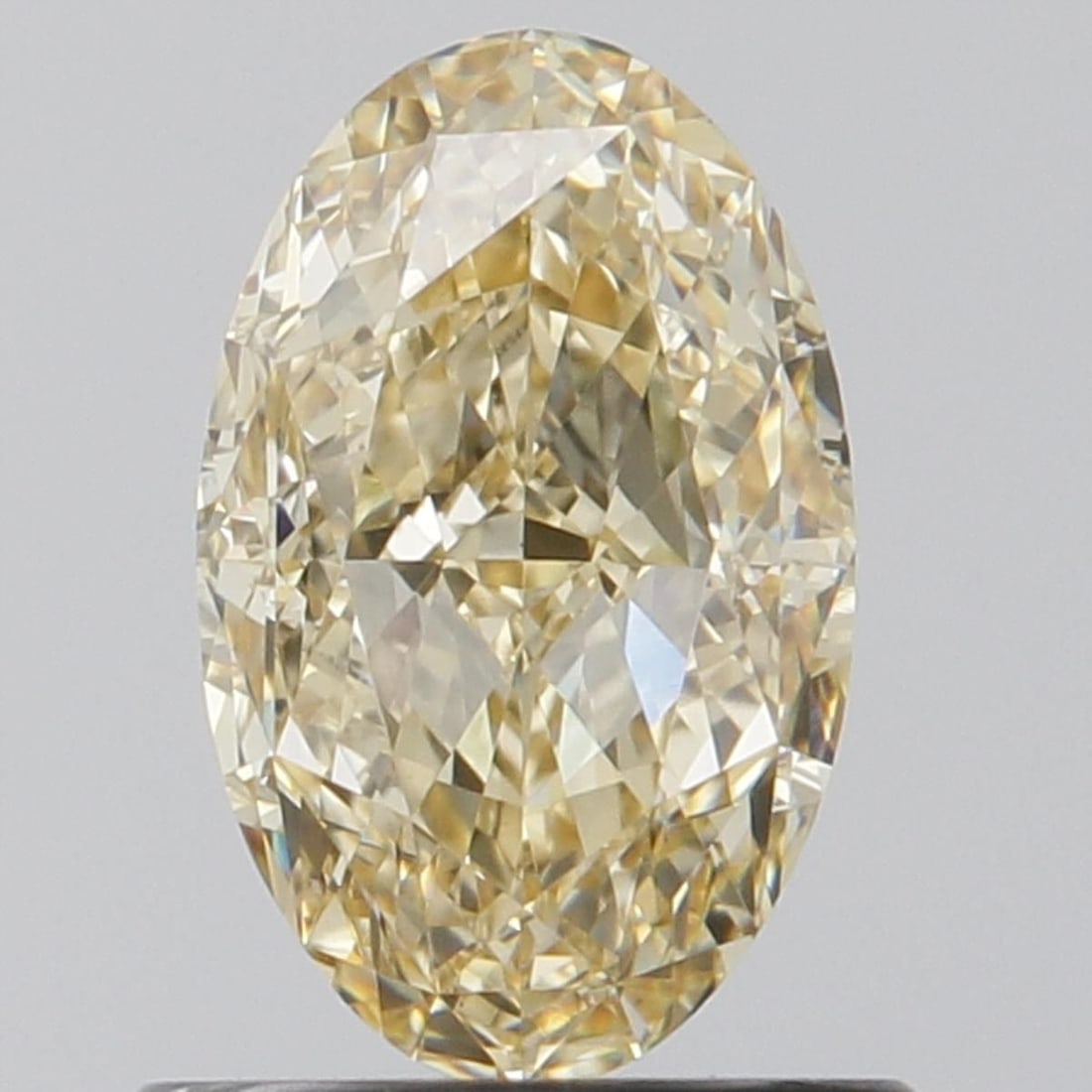 Loose Diamond - OVAL 1.03ct Fancy Intense Yellow VS1: Loose Diamond - OVAL 1.03ct Fancy Intense Yellow VS1 Source: This is a real non-mined Diamond that has been grown in a lab Shape: OVAL Carats: 1.03 Color: Fancy Intense Yellow Certification: IGI Video