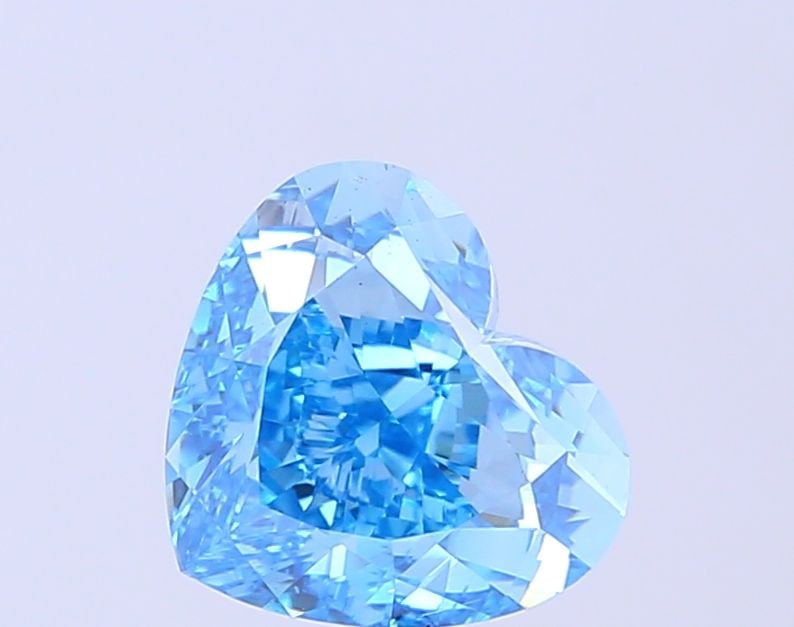 Loose Diamond - HEART 3.01ct Fancy Vivid Blue VS2: Loose Diamond - HEART 3.01ct Fancy Vivid Blue VS2 Source: This is a real non-mined Diamond that has been grown in a lab Shape: HEART Carats: 3.01 Color: Fancy Vivid Blue Certification: IGI Video: