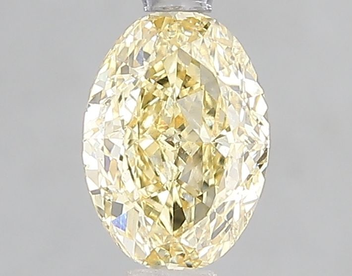 Loose Diamond - OVAL 1.1ct Fancy Yellow VS1: Loose Diamond - OVAL 1.1ct Fancy Yellow VS1 Source: This is a real non-mined Diamond that has been grown in a lab Shape: OVAL Carats: 1.1 Color: Fancy Yellow Certification: IGI Video: