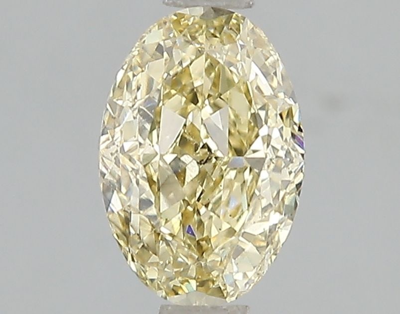 Loose Diamond - OVAL 1.5ct Fancy Intense Yellow VS2: Loose Diamond - OVAL 1.5ct Fancy Intense Yellow VS2 Source: This is a real non-mined Diamond that has been grown in a lab Shape: OVAL Carats: 1.5 Color: Fancy Intense Yellow Certification: IGI Video: