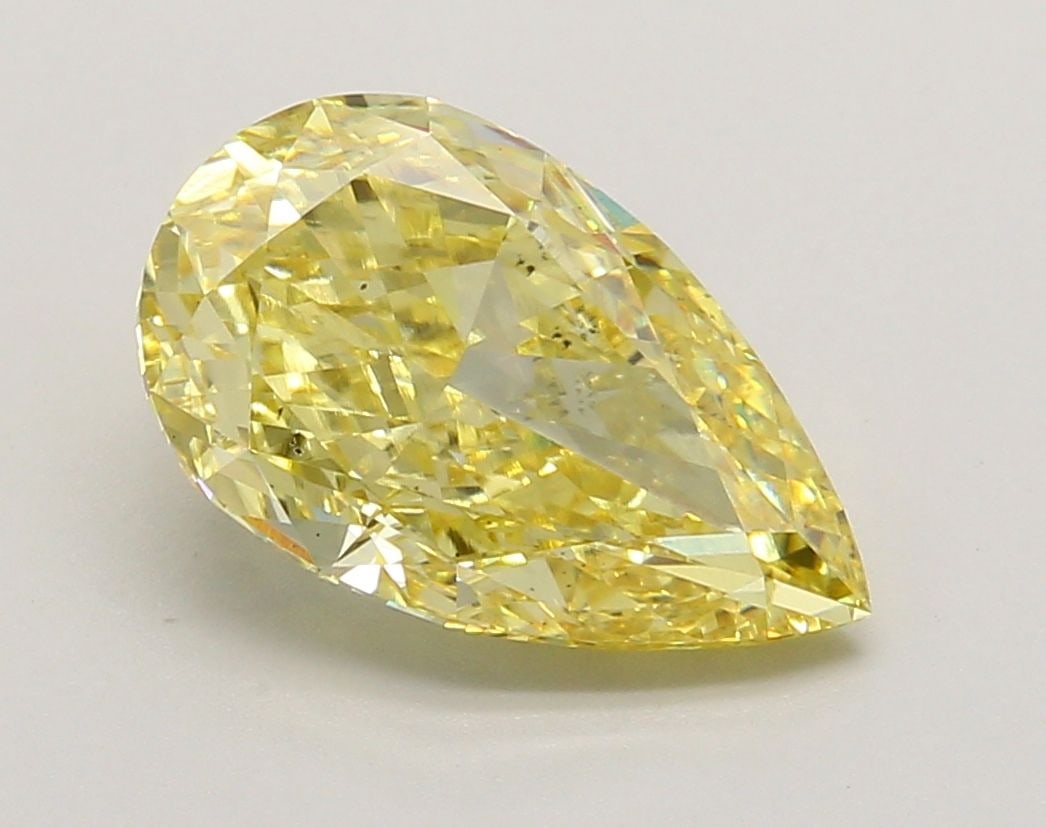 Loose Diamond - PEAR 3.21ct Fancy Vivid Yellow VS2: Loose Diamond - PEAR 3.21ct Fancy Vivid Yellow VS2 Source: This is a real non-mined Diamond that has been grown in a lab Shape: PEAR Carats: 3.21 Color: Fancy Vivid Yellow Certification: IGI Video: