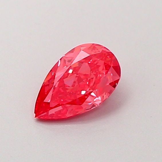 Loose Diamond - PEAR 0.51ct Fancy Vivid Pink VVS2: Loose Diamond - PEAR 0.51ct Fancy Vivid Pink VVS2 Source: This is a real non-mined Diamond that has been grown in a lab Shape: PEAR Carats: 0.51 Color: Fancy Vivid Pink Certification: IGI Video: