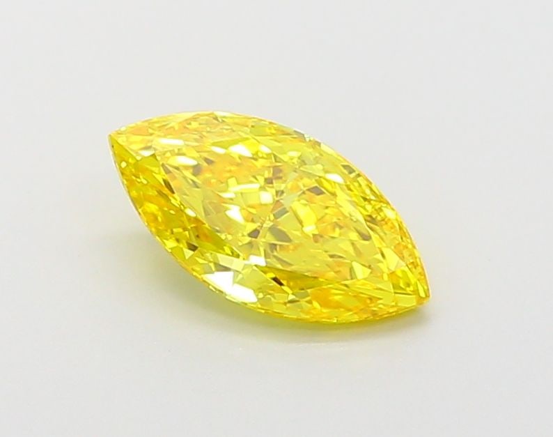 Loose Diamond - MARQUISE 0.99ct Fancy Vivid Yellow VVS2: Loose Diamond - MARQUISE 0.99ct Fancy Vivid Yellow VVS2 Source: This is a real non-mined Diamond that has been grown in a lab Shape: MARQUISE Carats: 0.99 Color: Fancy Vivid Yellow Certification: IGI 