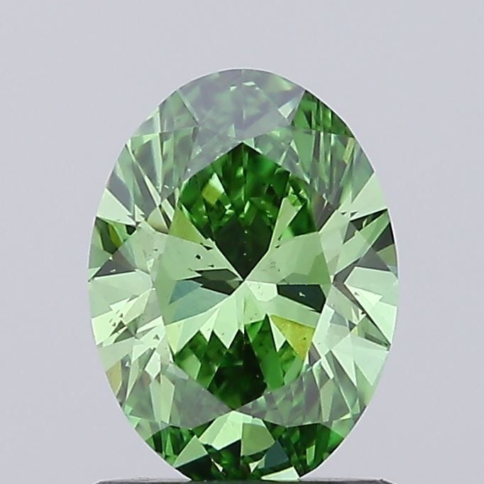 Loose Diamond - OVAL 1.01ct Fancy Vivid Green VS2: Loose Diamond - OVAL 1.01ct Fancy Vivid Green VS2 Source: This is a real non-mined Diamond that has been grown in a lab Shape: OVAL Carats: 1.01 Color: Fancy Vivid Green Certification: IGI Video: