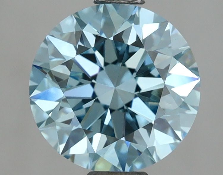 Loose Diamond - ROUND 1.91ct Fancy Vivid Blue VVS2: Loose Diamond - ROUND 1.91ct Fancy Vivid Blue VVS2 Source: This is a real non-mined Diamond that has been grown in a lab Shape: ROUND Carats: 1.91 Color: Fancy Vivid Blue Certification: IGI Video: