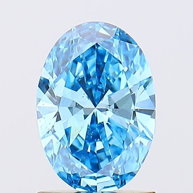Loose Diamond - OVAL 1.01ct Fancy Vivid Blue VS2: Loose Diamond - OVAL 1.01ct Fancy Vivid Blue VS2 Source: This is a real non-mined Diamond that has been grown in a lab Shape: OVAL Carats: 1.01 Color: Fancy Vivid Blue Certification: IGI Video: