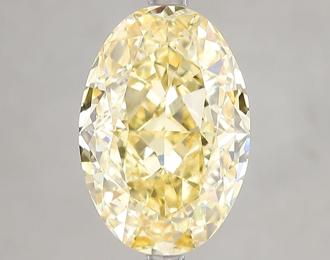 Loose Diamond - OVAL 5.17ct Fancy Vivid Yellow VVS2: Loose Diamond - OVAL 5.17ct Fancy Vivid Yellow VVS2 Source: This is a real non-mined Diamond that has been grown in a lab Shape: OVAL Carats: 5.17 Color: Fancy Vivid Yellow Certification: IGI Video: