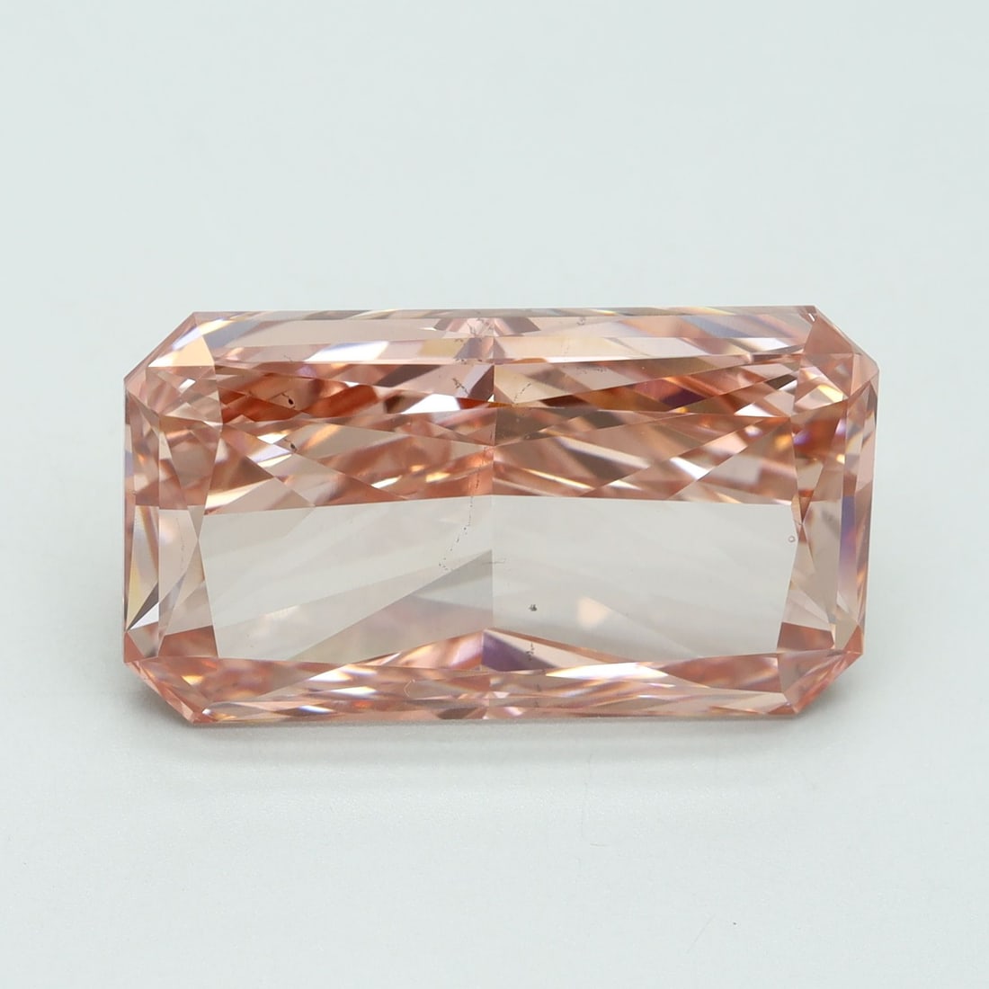Loose Diamond - RADIANT 11.58ct Fancy Vivid Pink VS2: Loose Diamond - RADIANT 11.58ct Fancy Vivid Pink VS2 Source: This is a real non-mined Diamond that has been grown in a lab Shape: RADIANT Carats: 11.58 Color: Fancy Vivid Pink Certification: IGI Video
