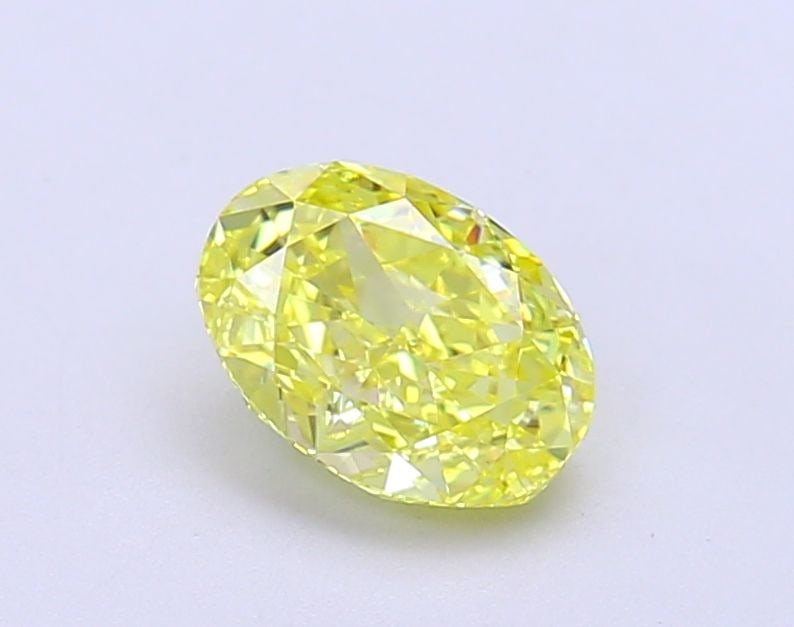 Loose Diamond - OVAL 1.07ct Fancy Vivid Yellow VVS2: Loose Diamond - OVAL 1.07ct Fancy Vivid Yellow VVS2 Source: This is a real non-mined Diamond that has been grown in a lab Shape: OVAL Carats: 1.07 Color: Fancy Vivid Yellow Certification: IGI Video: