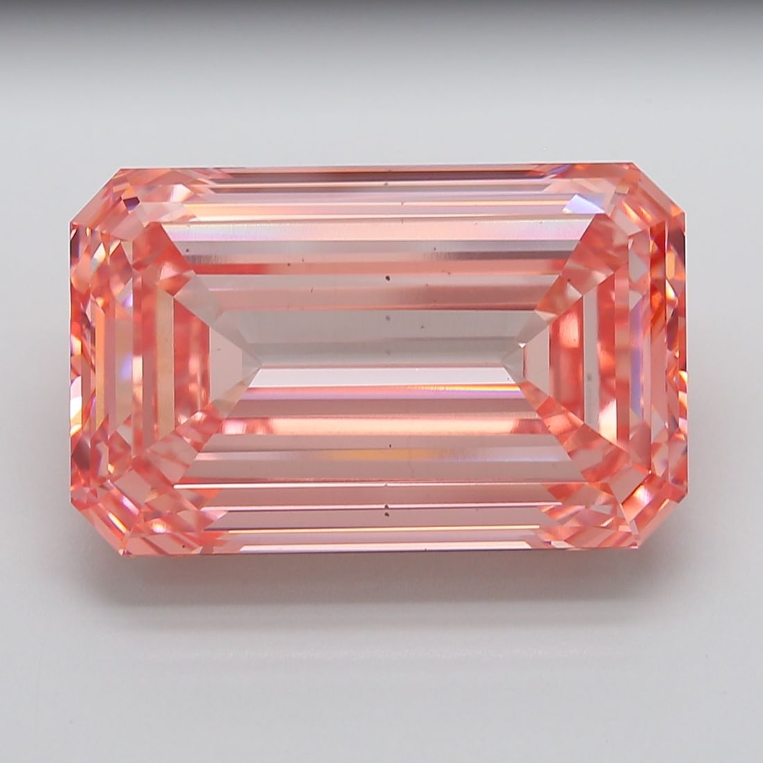Loose Diamond - EMERALD 32.25ct Fancy Vivid Pink VS1: Loose Diamond - EMERALD 32.25ct Fancy Vivid Pink VS1 Source: This is a real non-mined Diamond that has been grown in a lab Shape: EMERALD Carats: 32.25 Color: Fancy Vivid Pink Certification: IGI Video