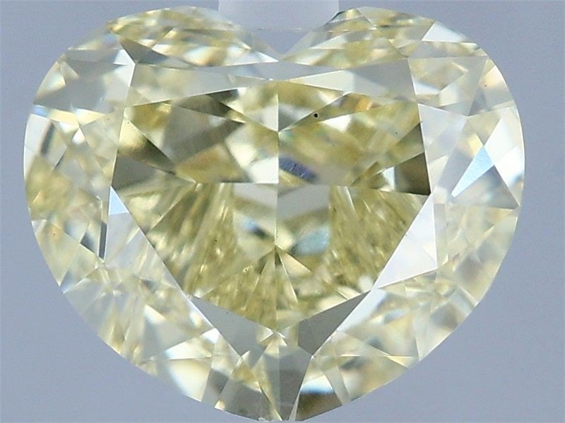 Loose Diamond - HEART 2.04ct Fancy Yellow VS1: Loose Diamond - HEART 2.04ct Fancy Yellow VS1 Source: This is a real non-mined Diamond that has been grown in a lab Shape: HEART Carats: 2.04 Color: Fancy Yellow Certification: IGI Video: