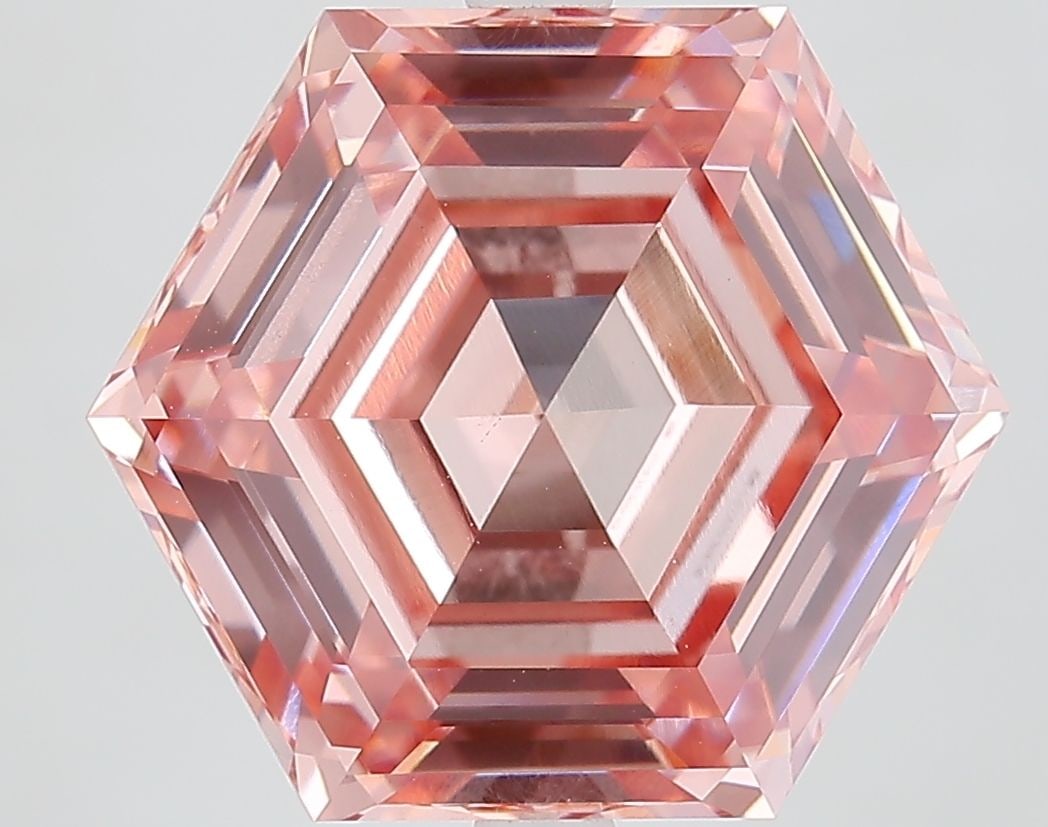 Loose Diamond - HEXAGONAL 8.03ct Fancy Vivid Pink VVS2: Loose Diamond - HEXAGONAL 8.03ct Fancy Vivid Pink VVS2 Source: This is a real non-mined Diamond that has been grown in a lab Shape: HEXAGONAL Carats: 8.03 Color: Fancy Vivid Pink Certification: IGI Vi