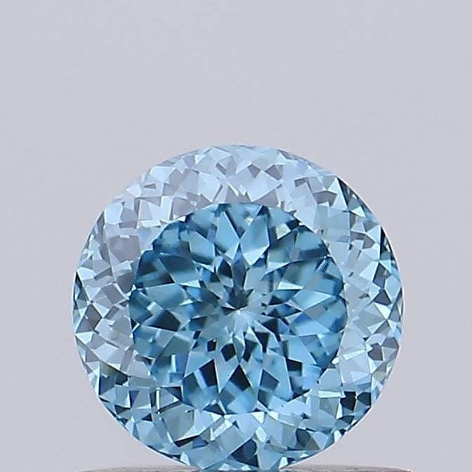 Loose Diamond - ROUND 0.68ct Fancy Vivid Blue VS1: Loose Diamond - ROUND 0.68ct Fancy Vivid Blue VS1 Source: This is a real non-mined Diamond that has been grown in a lab Shape: ROUND Carats: 0.68 Color: Fancy Vivid Blue Certification: IGI Video: