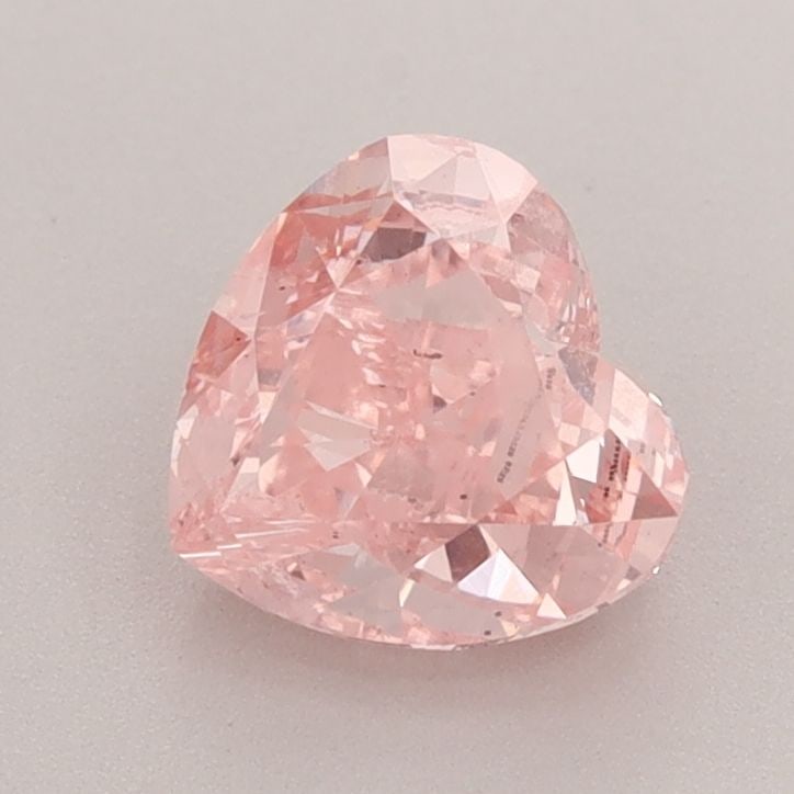 Loose Diamond - HEART 1.47ct Fancy Vivid Pink VS2: Loose Diamond - HEART 1.47ct Fancy Vivid Pink VS2 Source: This is a real non-mined Diamond that has been grown in a lab Shape: HEART Carats: 1.47 Color: Fancy Vivid Pink Certification: IGI Video:
