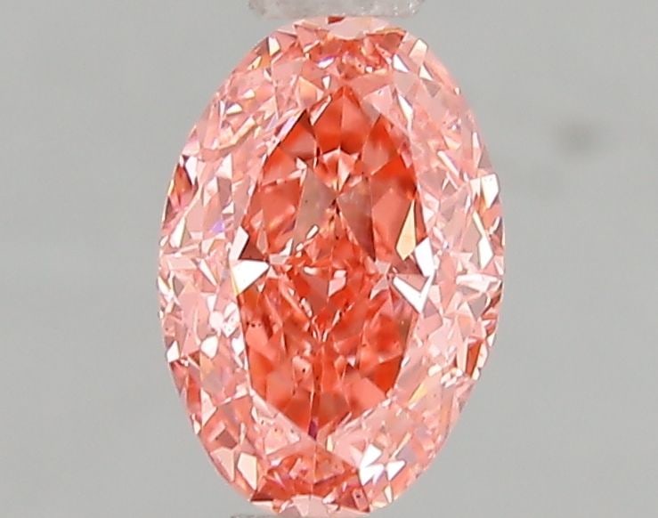 Loose Diamond - OVAL 1.03ct Fancy Vivid Pink SI1: Loose Diamond - OVAL 1.03ct Fancy Vivid Pink SI1 Source: This is a real non-mined Diamond that has been grown in a lab Shape: OVAL Carats: 1.03 Color: Fancy Vivid Pink Certification: IGI Video:
